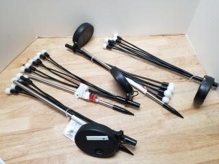 4 sets of solar powered lights,  three poles