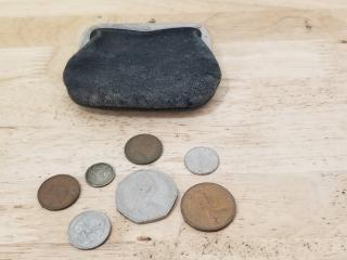 Old coin purse with foreign coins 