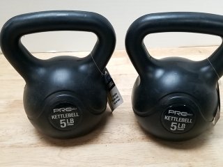 New Pair of 5 LB Kettlebells