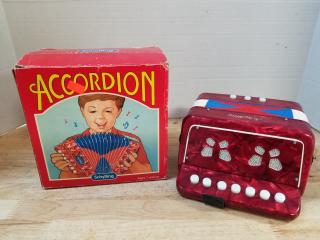 Vintage  Schylling Accordion,  good cond, works, 9 in