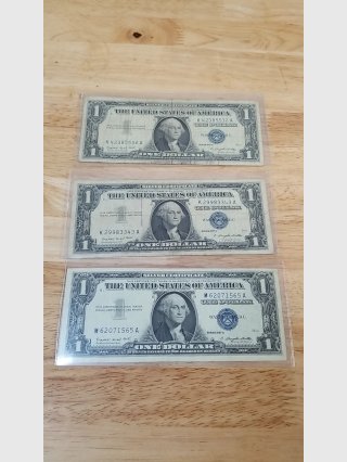 Three $1 Silver Certificates, 1957 A