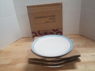 New set of 4 dinner plates, each 10 inch