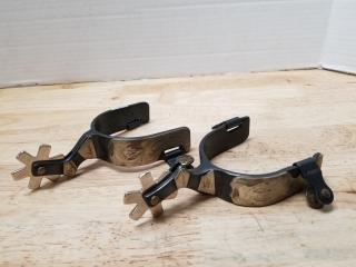 Pair of spurs each approx 3 inch wide