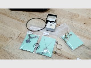 Numerous pieces of sterling silver jewelry
