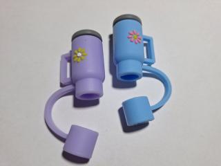 Two silicone straw toppers