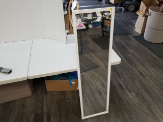 New door mirror approx 50 by 14 inches 