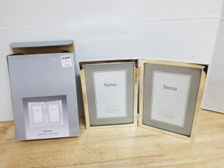 New photo frame, each holds a 7 by 5 inch photo 