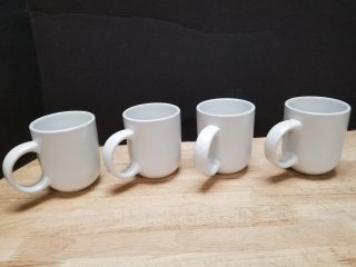 New 4 piece mug set each holds 13 oz