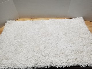 New 21x54 inch looped bath rug