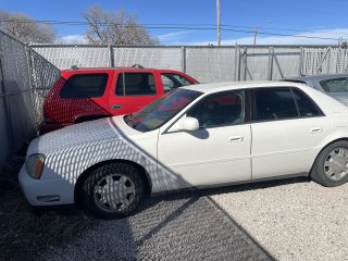 2005 White Cadillac Deville     26-00024
