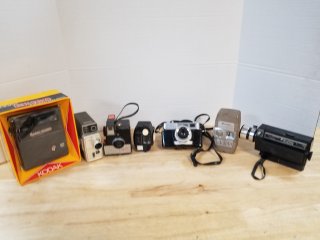 Vintage cameras, due to age sell as is