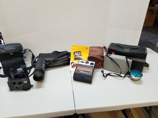 Vintage cameras, due to age sell as is