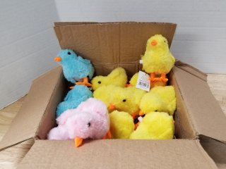New box of wind up hopping chicks 