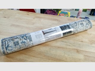 New Gray Area Rug in Packaging