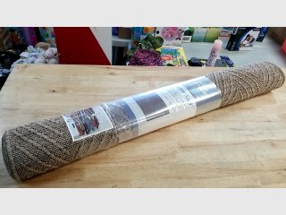 New Braided Jute Area Rug in Packaging