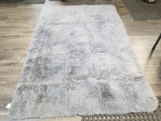 Rug 72 by 50 inches 