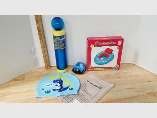  CoComelon float, ladybug toy, dino swim cap, misc