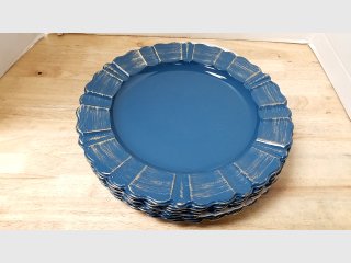 Stack of Blue Scalloped Charger plates