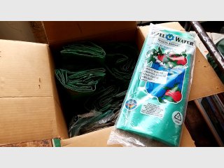 Box full of Wall O Water Plant Protectors Pack