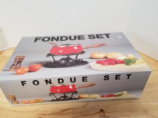 Fondue set, good shape, color is black 