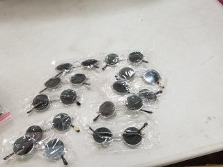 10 new pairs of sunglasses 