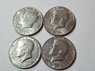 4 Kennedy half dollars