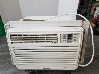 Window air conditioner approx 20 by 18 by 4 inch