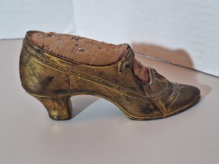 Vintage metal shoe pin cushion , some damage
