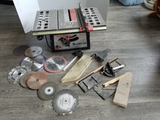 10 inch table saw with attachments/blades