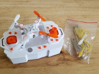 Mini Drone with Controller and Accessori, Drone is 4 in