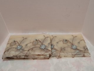 Embroidered sheer fabric panels
