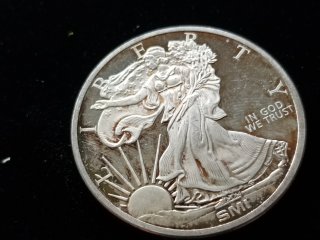 One troy ounce .999 fine silver 