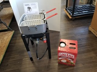 FISH fryer and oil, appears to never been  used 