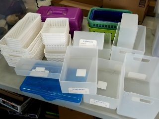 Numerous plastic organizers, trays, 12 in