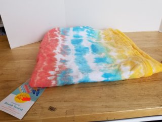 New beach towel 62 by 32 inch