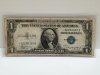 Item #99 — 1935 A $1 Silver certificate star note