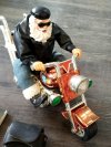 Item #241 — Santa Biker Figurine with Book & Pouch photo 2 of 5