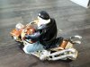 Item #241 — Santa Biker Figurine with Book & Pouch photo 3 of 5