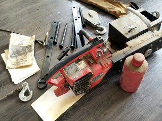 Item #262 — HOMELITE chainsaw and winch lot photo 6 of 6