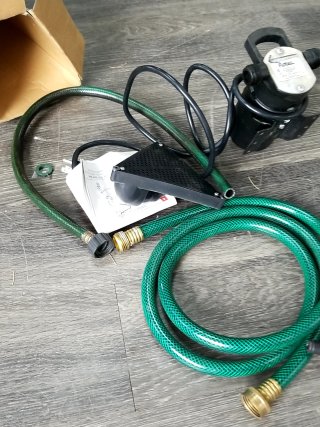 Item #228 — Flotec Utility Pump in Box photo 4 of 5