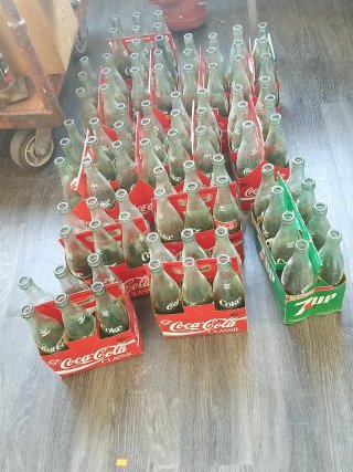 Item #319 — EMPTY Coca-Cola bottles photo 1 of 3