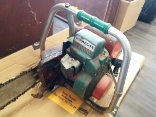 Item #265 — HOMELITE 700 Chainsaw, 22 inch blade, sells as is photo 3 of 4