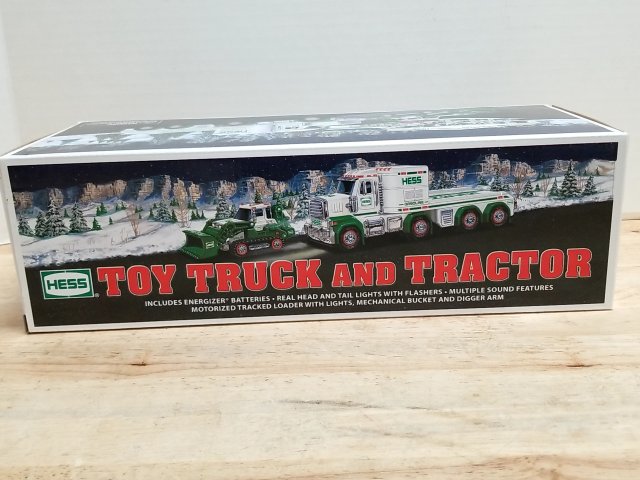 Item #90 — New HESS Toy Truck and Tractor Set, lights/sounds, 13 inch long photo 1 of 4