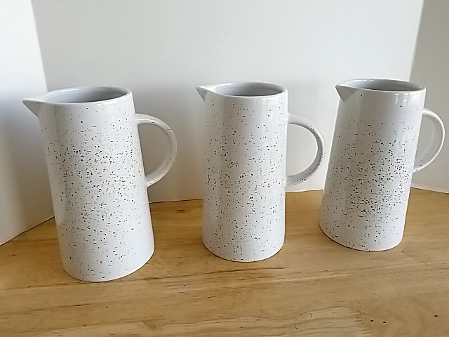 Item #506 — New Speckled Ceramic Pitchers 11 in photo 1 of 3