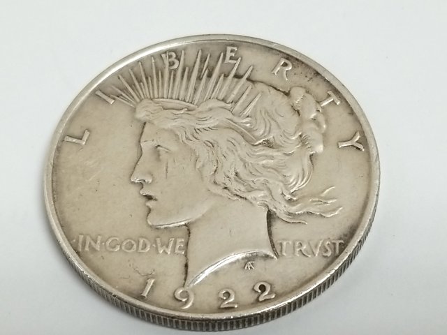 Item #16 — 1922 D Peace Silver Dollar Coin photo 1 of 2