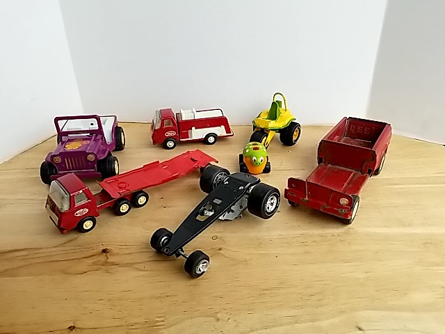 Item #85 — Vintage Tonka toys, largest 9 inch long photo 1 of 10