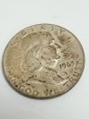 Item #25 — 1963 D Ben Franklin Silver Half Dollar photo 1 of 2