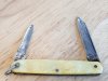 Item #46 — Vintage Yellow Pocket Knife, 8 in open photo 1 of 3