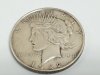 Item #16 — 1922 D Peace Silver Dollar Coin photo 1 of 2