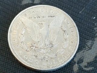 Item #48 — 1885 O Morgan Silver Dollar photo 2 of 2